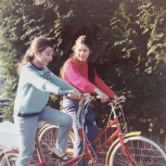 Cycling with my sister (red jumper) aged 10